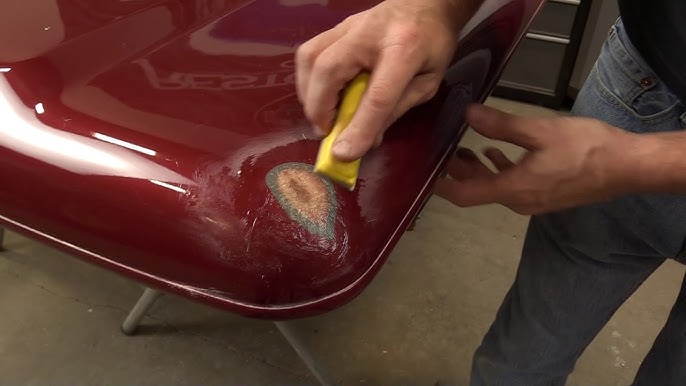 Fiberglass boat hull repair in progress